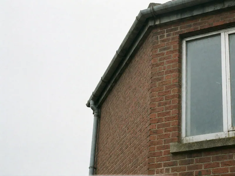 The corner of a brick building in Woodside